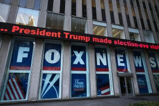 FILE — A headline about President Donald Trump is shown outside Fox News studios, Nov. 28, 2018, in New York. A New York appeals court, Tuesday, Feb. 14, 2023 rejected Fox News' bid to shut down a multibillion-dollar defamation lawsuit accusing the network of spreading lies that Smartmatic USA helped "steal" the 2020 election from then-U.S. President Donald Trump. (AP Photo/Mark Lennihan, File)