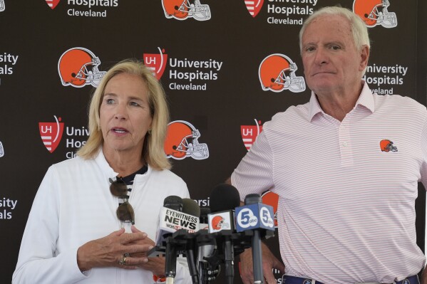 Cleveland Browns owners Dee and Jimmy Haslam speak during an NFL football training camp practice in White Sulphur Springs, W.Va., Saturday, July 27, 2024. (AP Photo/Sue Ogrocki, file)