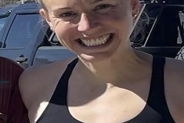 In this photo provided by the Memphis Police Department, 34-year-old Eliza Fletcher is shown. Authorities in Tennessee searched Friday, Sept. 2, 2022, for Fletcher, who police said was abducted and forced into a vehicle while she was jogging near the University of Memphis campus. (Courtesy of Memphis Police Department via AP)