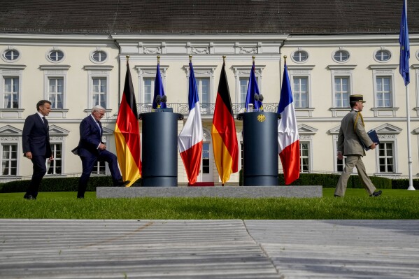 Macron begins the first state visit to Germany by a French president in 24  years | AP News