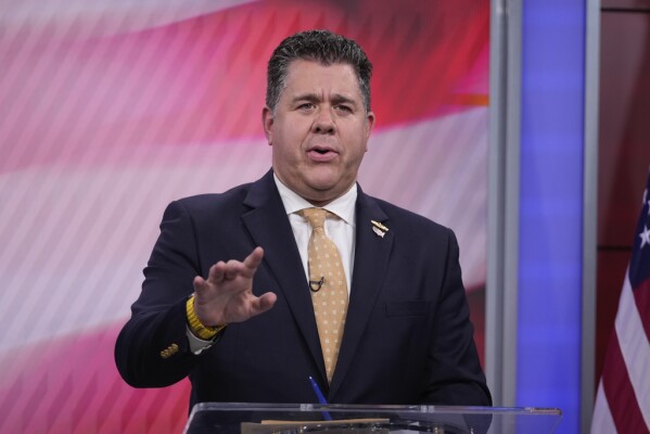  Rep. Nick LaLota, R-N.Y., speaks during a debate with Democratic candidate, John Avlon, for New York's 1st Congressional District, Wednesday, Oct. 23, 2024, in Bethpage, N.Y. (AP Photo/Frank Franklin II)