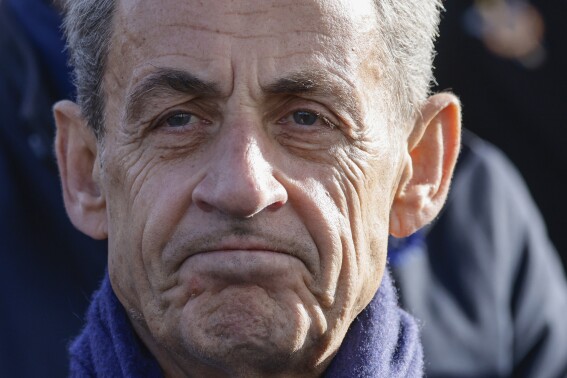 Former French President Nicolas Sarkozy looks on as he attends a ceremony at the Arc de Triomphe, as part of the commemorations marking the105th anniversary of the Nov. 11, 1918 Armistice, ending World War I, Saturday, Nov. 11, 2023 in Paris. An appeals court in Paris on Wednesday, Feb. 14, 2024 upheld a guilty verdict against former French President Nicolas Sarkozy for illegal campaign financing in his failed 2012 re-election bid. (Ludovic Marin/Pool via AP)
