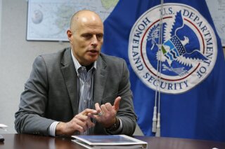 In this Nov. 9, 2018, photo, acting ICE director Ron Vitiello gestures during an interview in Richmond, Va. The White House has pulled the nomination of longtime border official Vitiello to lead U.S. Immigration and Customs Enforcement. That's according to people familiar with the matter who say the notice was sent to members of Congress Thursday, April 4, 2019. (AP Photo/Steve Helber)