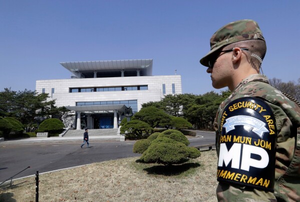 FILE - A U.S. soldier stands outside of the Peace House, the venue for the planned summit between South Korean President Moon Jae-in and North Korean leader Kim Jong Un during a press tour at the southern side of the Panmunjom in the Demilitarized Zone, South Korea on April 18, 2018. An American has crossed the heavily fortified border from South Korea into North Korea, the American-led U.N. Command overseeing the area said Tuesday, July 18, 2023, amid heightened tensions over North Korea's nuclear program. (AP Photo/Lee Jin-man, File)
