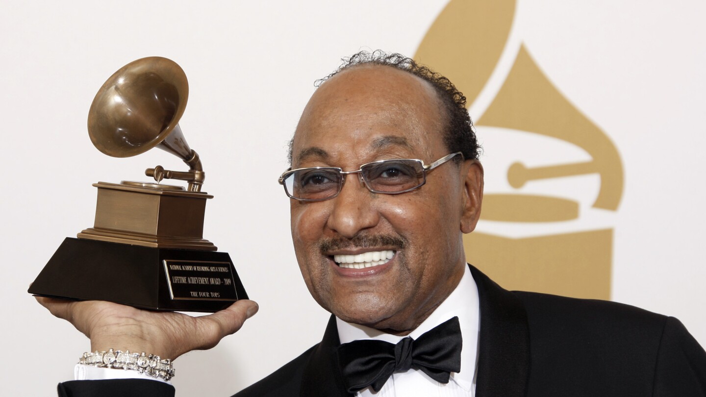 FILE - Duke Fakir holds his life time achievement award backstage at the 51st Annual Grammy Awards in Los Angeles on Feb. 8, 2009. Fakir wrote a memoir, "I'll Be There: My Life With The Four Tops." Fakir, the last of the original Four Tops, died Monday of heart failure at age 88.(AP Photo/Matt Sayles, File)