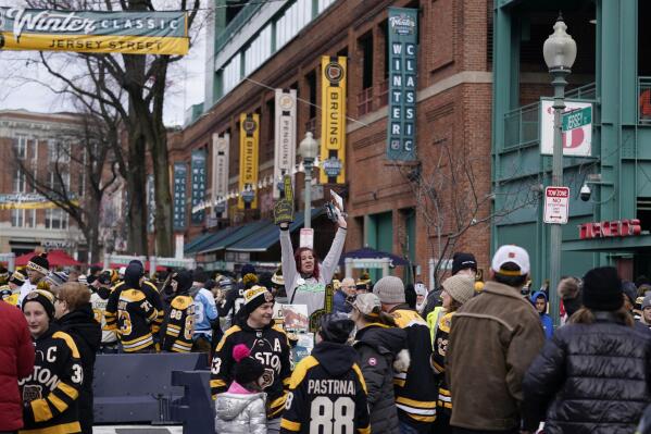 NHL's Winter Classic: Bruins and Penguins players don Red Sox and
