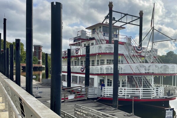 FILE - The Harriott II riverboat sits docked in Montgomery, Ala., on Tuesday, Aug. 8, 2023. A riverfront brawl occurred on Aug. 5 when a crew member was punched for trying to move a pontoon boat that was blocking the riverboat from docking. (AP Photo/Kim Chandler, File)