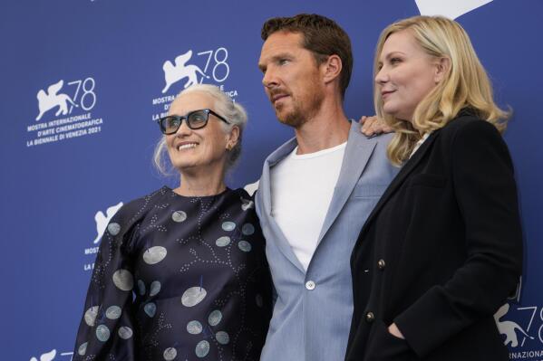Jane Campion, from left, Benedict Cumberbatch and Kirsten Dunst pose for photographers at the photo call for the film 'The Power Of The Dog' during the 78th edition of the Venice Film Festival in Venice, Italy, Thursday, Sep, 2, 2021. (AP Photo/Domenico Stinellis)