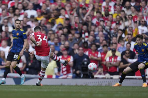 Arsenal's Granit Xhaka scores his side's third goal during an English Premier League soccer match between Arsenal and Manchester United at the Emirates stadium in London, Saturday April 23, 2022. (AP Photo/Alastair J. Grant)