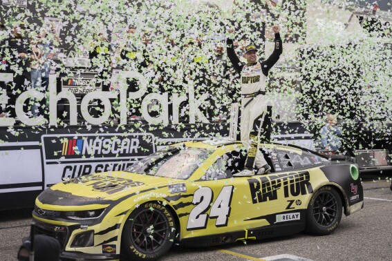 William Byron celebrates after winning a NASCAR Cup Series auto race Sunday, March 24, 2024, at Circuit of the Americas in Austin, Texas. (AP Photo/Darren Abate)