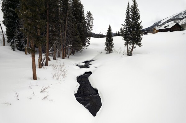  snowfall is arriving later and disappearing earlier arsenic nan world warms. That’s a concerning motion for millions of group successful nan drought-stricken Southwest who trust connected upland snowpack to slow melt passim outpouring and summertime to supply a dependable watercourse of h2o for cities, agriculture and ecosystems. (AP Photo/Brittany Peterson)