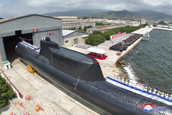 FILE - This photo provided by the North Korean government shows what it says is a new nuclear attack submarine "Hero Kim Kun Ok" during a launching ceremony at an unspecified place in North Korea on Sept. 6, 2023. Independent journalists were not given access to cover the event depicted in this image distributed by the North Korean government. The content of this image is as provided and cannot be independently verified. Korean language watermark on image as provided by source reads: "KCNA" which is the abbreviation for Korean Central News Agency. (Korean Central News Agency/Korea News Service via AP, File)