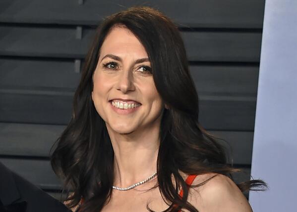 FILE - In this March 4, 2018, file photo, MacKenzie Bezos arrives at the Vanity Fair Oscar Party in Beverly Hills, Calif. Philanthropist MacKenzie Scott has funded organizations that received the most money for racial equity in 27 different states following the police killing of George Floyd. According to an AP analysis of new preliminary data from the philanthropy research organization Candid, Scott was responsible for approximately $567 million given to these organizations. (Photo by Evan Agostini/Invision/AP, File)