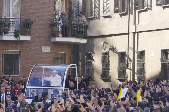 Pope Francis arrives to preside over the holy mass in the Cathedral of Asti, northern Italy, Sunday, Nov. 20, 2022, to meet the diocesan community from which his parents had left to emigrate to Argentina and the young people from all over the region on the occasion of the XXXVII World Youth Day. (AP Photo/Gregorio Borgia)