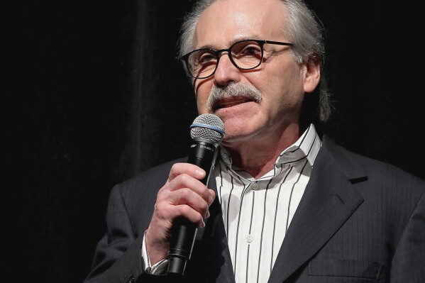 FILE - David Pecker, chairman and CEO of American Media, speaks at an event, Jan. 31, 2014 in New York. Testimony by the former National Enquirer publisher at Donald Trump's hush money trial this week has revealed an astonishing level of corruption at America's best-known tabloid and may one day be seen as the moment it effectively died. On Thursday, April 25, 2024 Pecker was back on the witness stand to tell more about the arrangement he made to boost Trump's presidential candidacy in 2016, tear down his rivals and silence any revelations that may have damaged him. (Marion Curtis via AP, File)