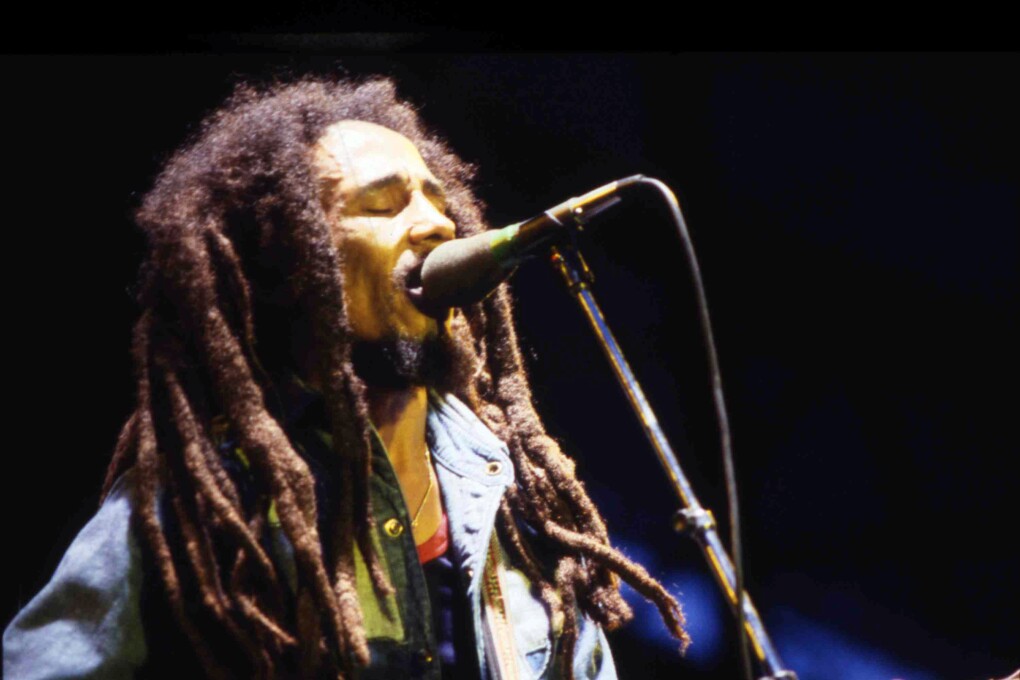 Jamaican Reggae singer Bob Marley performs on stage during a concert in Bourget, Paris, on July 3, 1980. (AP Photo/Jacques Langevin)