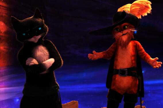 This image released by DreamWorks Animation shows the characters Kitty Softpaws, voiced by Salma Hayek Pinault, left, and Puss in Boots, voiced by Antonio Banderas, from the animated film "Puss in Boots: The Last Wish" by director Joel Crawford. (DreamWorks Animation via AP)