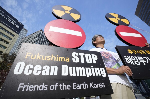 A member of civic groups participates in a rally to demand the stop of the Japans release of treated radioactive water from the damaged Fukushima nuclear power plant into ocean in Seoul South Korea Thursday Nov 2 2023 AP PhotoAhn Young-joon