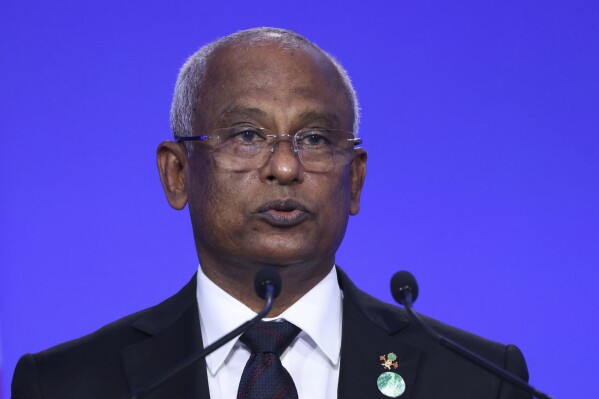 FILE- Maldives President Ibrahim Mohamed Solih speaks at the opening ceremony of the UN Climate Change Conference COP26 in Glasgow, Scotland, Nov. 1, 2021. Incumbent President Ibrahim Mohamed Solih and seven other candidates have registered to run in the Maldives’ presidential elections next month, the island archipelago’s fourth since becoming a multiparty democracy in 2008. (Yves Herman/Pool via AP, File)