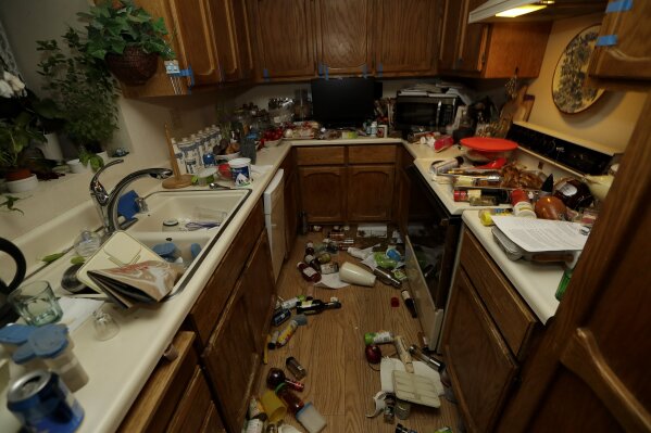 Items are scattered around a kitchen Saturday, July 6, 2019 following a earthquake in Ridgecrest, Calif. The Friday evening quake with a magnitude of about 7.1 jolted much of California, cracking buildings, setting fires, breaking roads and causing several injuries while seismologists warned that large aftershocks were expected to continue for days, if not weeks. ( AP Photo/Marcio Jose Sanchez)