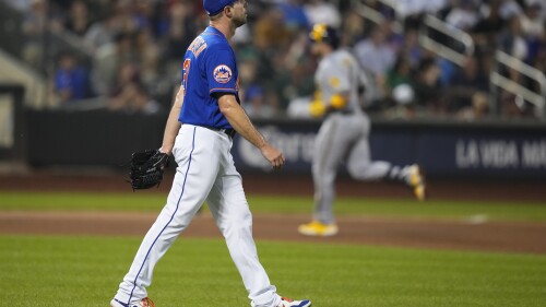 New York Mets starting pitcher Max Scherzer waits as Milwaukee Brewers' Victor Caratini runs the bases after hitting a two-run home run during the sixth inning of a baseball game Thursday, June 29, 2023, in New York. (AP Photo/Frank Franklin II)