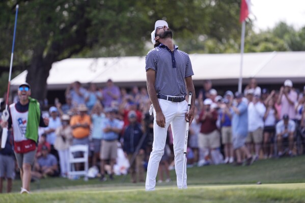 Akshay Bhatia reacts after making a putt in a playoff to defeat Denny McCarthy at Texas Open golf tournament, Sunday, April 7, 2024, in San Antonio. (AP Photo/Eric Gay)