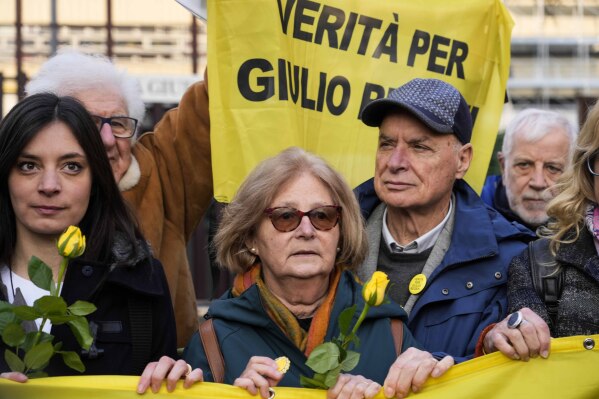 Paola, mother of Giulio Regeni, is flanked by by her husband Claudio prior to the start of the trial for the killing of Cambridge University researcher Giulio Regeni, at the Rome's court, Tuesday, Feb. 20, 2024. Four high-level Egyptian security officials are going on trial in absentia in a Rome court, accused in the 2016 abduction, torture and slaying of an Italian doctoral student in Cairo. (APPhoto/Andrew Medichini)