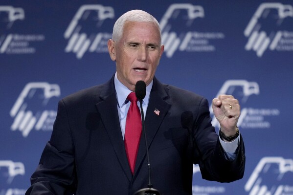 FILE - Former Vice President Mike Pence speaks at an event Friday, Nov. 18, 2022, in Las Vegas. As Donald Trump seeks the presidency a third time, he's being shadowed by a chorus of people who served in his administration turned sharp critics. Pence has declined to endorse Trump, his former running mate. (AP Photo/John Locher, File)