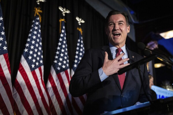 Former U.S. Rep. Tom Suozzi, Democratic candidate for New York's 3rd congressional district, speaks at his election night party Tuesday, Feb. 13, 2024, in Woodbury, N.Y. Suozzi won a special election for the House seat formerly held by George Santos. (AP Photo/Stefan Jeremiah)