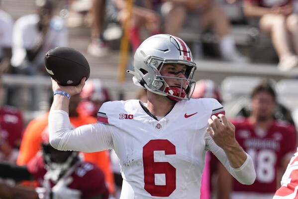 Ohio State quarterback Kyle McCord throws during the first half of an NCAA college football game against Indiana, Saturday, Sept. 2, 2023, in Bloomington, Ind. (AP Photo/Darron Cummings)