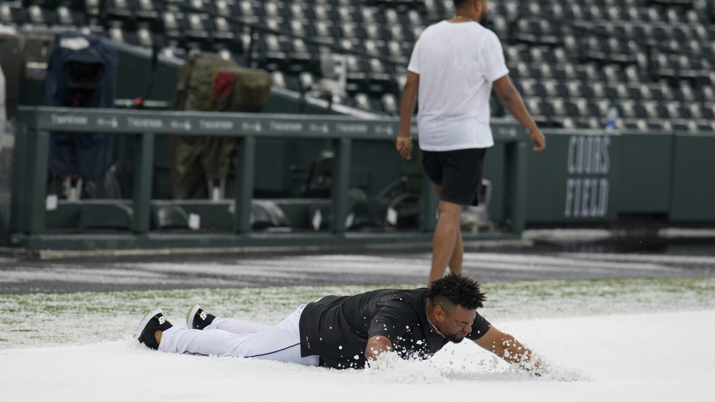 Coors Field pummeled by hail before Colorado Rockies, Toronto Blue Jays game
