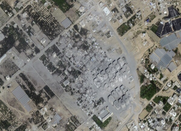 This image provided by Maxar Technologies shows after significant damage to buildings and structures in Atatra, northern Gaza, on Oct. 21, 2023. (Satellite image ©2023 Maxar Technologies via AP)
