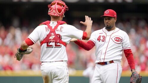 Cincinnati Reds relief pitcher Alexis Diaz (43) celebrates with catcher Luke Maile (22) after a baseball game against the San Diego Padres, Sunday, July 2, 2023, in Cincinnati. (AP Photo/Jeff Dean)