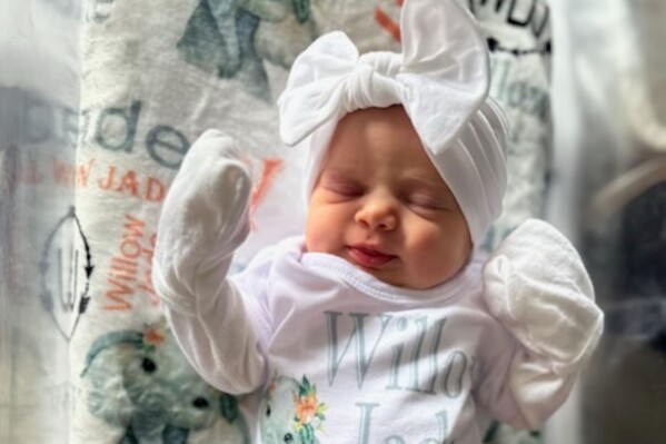 This family photo shows Willow Jade Dellaquila, a day after she was born in October 2023, in La Grange, Ky. Willow Jade died at the age of 13-days-old in November 2023, after contracting a Cronobacter sakazakii infection traced to a can of Similac Total Comfort powdered infant formula. (Family photo via AP)