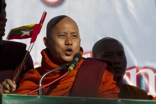 FILE - In this Sunday, Oct. 14, 2018 file photo, Buddhist monk and anti-Muslim community leader Wirathu speaks during a pro-military rally in front of city hall in Yangon, Myanmar. A ultranationalist Buddhist monk notorious for his anti-Muslim remarks was freed from prison Monday, Sept. 6, 2021 after charges that he tried to stir up disaffection against Myanmar's previous civilian government were dropped. News of the release of Wirathu was reported by People Media, an online newsite, which said on Facebook that it had received confirmation from Maj. Gen. Zaw Min Tun, a spokesman for the Myanmar military, also known as the Tatmadaw. (AP Photo/Thein Zaw, file)