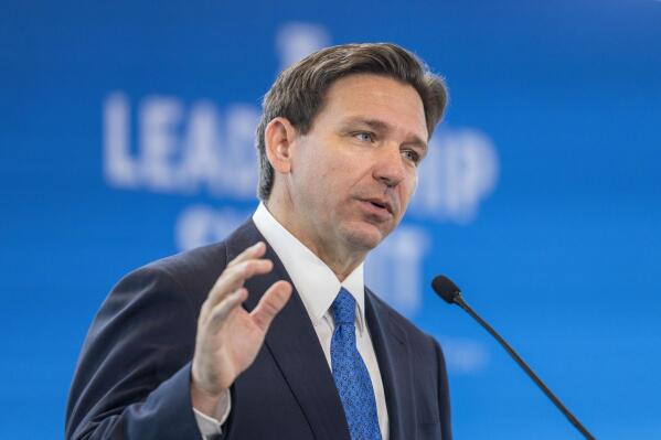 FILE - Florida Gov. Ron DeSantis speaks at the Heritage Foundation 50th Anniversary Celebration leadership summit, Friday, April 21, 2023, in Oxon Hill, Md. A new sense of urgency is growing among DeSantis’ allies as emboldened critics within his own party, especially President Donald Trump, work to undermine his presidential campaign before it begins. (AP Photo/Alex Brandon, File)
