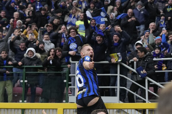 Inter Milan's Davide Frattesi celebrates after scoring his side's second goal during the Serie A soccer match between Inter Milan and Hellas Verona at the San Siro Stadium in Milan, Italy, Saturday, Jan. 6, 2024. (AP Photo/Antonio Calanni)