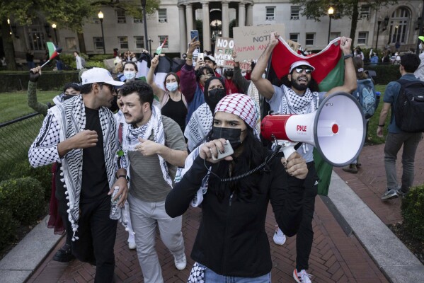 Palestinian supporters, including Mahmoud Khalil, second from left, demonstrate during a protest at Columbia University, Thursday, Oct. 12, 2023, in New York. (AP Photo/Yuki Iwamura, File)