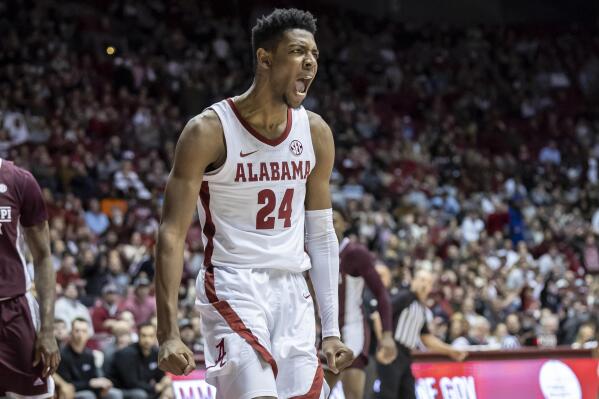 Alabama forward Brandon Miller (24) reacts to his dunk during the first half of an NCAA college basketball game against Mississippi State, Wednesday, Jan. 25, 2023, in Tuscaloosa, Ala. (AP Photo/Vasha Hunt)