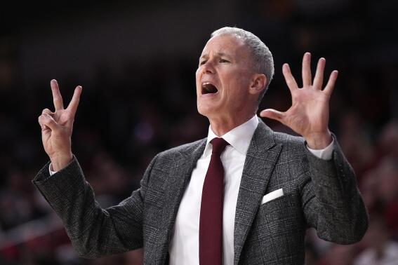 Southern California head coach Andy Enfield gestures to his team during the second half of an NCAA college basketball game against Arizona Thursday, March 2, 2023, in Los Angeles. (AP Photo/Mark J. Terrill)