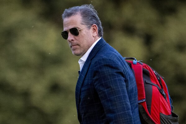 FILE - Hunter Biden, the son of President Joe Biden, walks from Marine One upon arrival at Fort McNair, June 25, 2023, in Washington. Hunter Biden has been indicted on nine tax charges in California as a special counsel investigation into the business dealings of the president's son intensifies against the backdrop of the looming 2024 election.(AP Photo/Andrew Harnik, File)