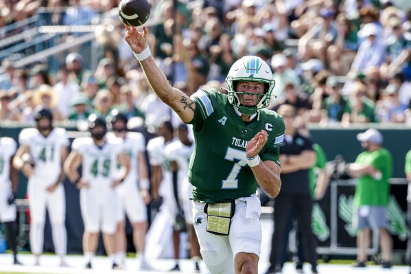 Tulane quarterback Michael Pratt (7) throws against North Texas during the first half of an NCAA college football game in New Orleans, Saturday, Oct. 21, 2023. (AP Photo/Derick Hingle)