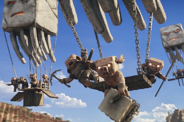 This image released by Warner Bros. Pictures shows a scene from "A Minecraft Movie." (Warner Bros. Pictures via AP)