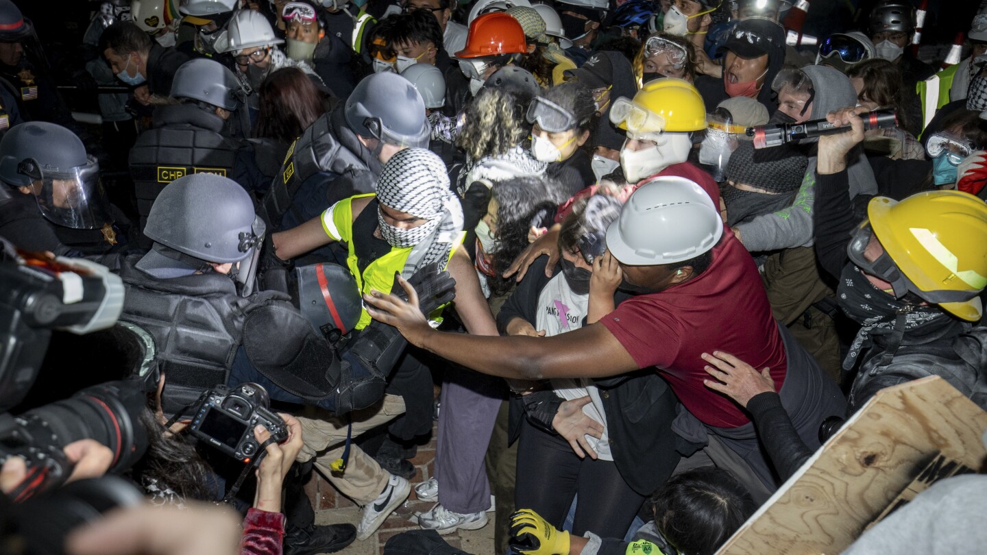 Officer fired gun while clearing protesters from Columbia building, prosecutors say