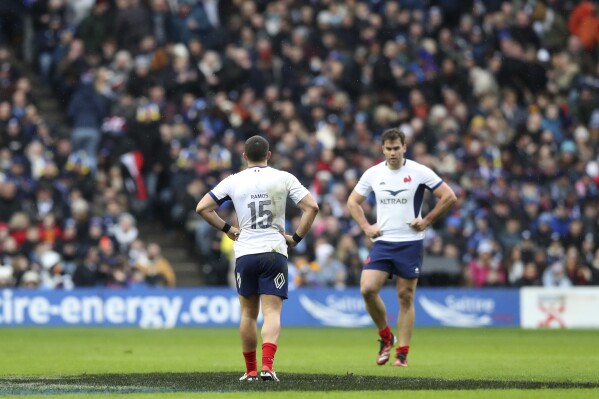 Thomas Ramos of France , left, and Damian Penaud of France reacts after Scotland scored a try during the Six Nations rugby union match between Scotland and France at Murrayfield stadium in Edinburgh, Scotland, Saturday, Feb. 10, 2024. (AP Photo/Scott Heppell)