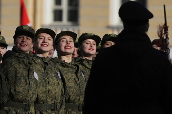 Russian soldiers attend a rehearsal for the Victory Day military parade at the Dvortsovaya (Palace) Square in St. Petersburg, Russia, Wednesday, April 30, 2025. (AP Photo/Dmitri Lovetsky)