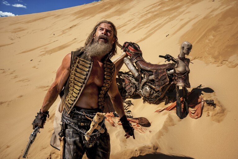This image released by Warner Bros. Pictures shows Chris Hemsworth in a scene from "Furiosa: A Mad Max Saga." (Warner Bros. Pictures via AP)
