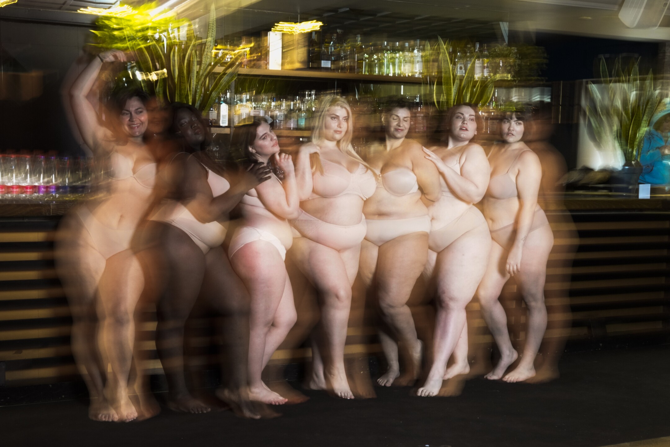 Models pose during a photo shoot for L'Imperfetta (The Imperfect) model agency in Rome on Feb. 7, 2023. The agency represents people who don't fit neatly into the fashion industry's pre-established standards of beauty. (AP Photo/Alessandra Tarantino)