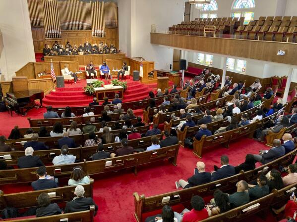 Members of Congress and others gather inside 16th Street Baptist Church in Birmingham, Ala., during a service on Friday, March 4, 2022. The event was part of a civil rights pilgrimage organized by the Washington-based Faith & Politics Institute. (AP Photo/Jay Reeves)
