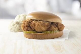 This image released by Chick-fil-A, Inc. shows the new, plant based, Chick-fil-A Cauliflower Sandwich. (Chick-fil-A, Inc. via AP)
